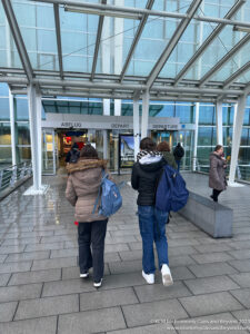 a group of people walking outside a building