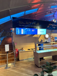 a man standing in front of a display