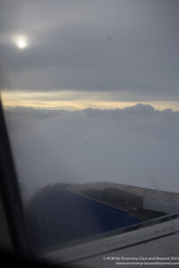 a view of clouds from an airplane window