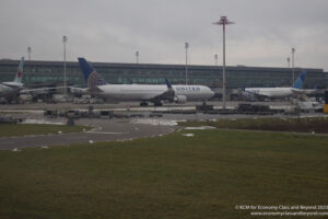 a large white airplane on a runway