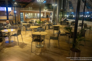 a room with tables and chairs