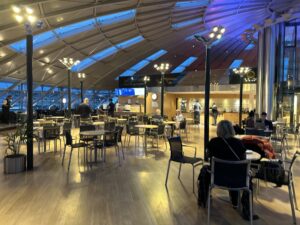 a large room with tables and chairs