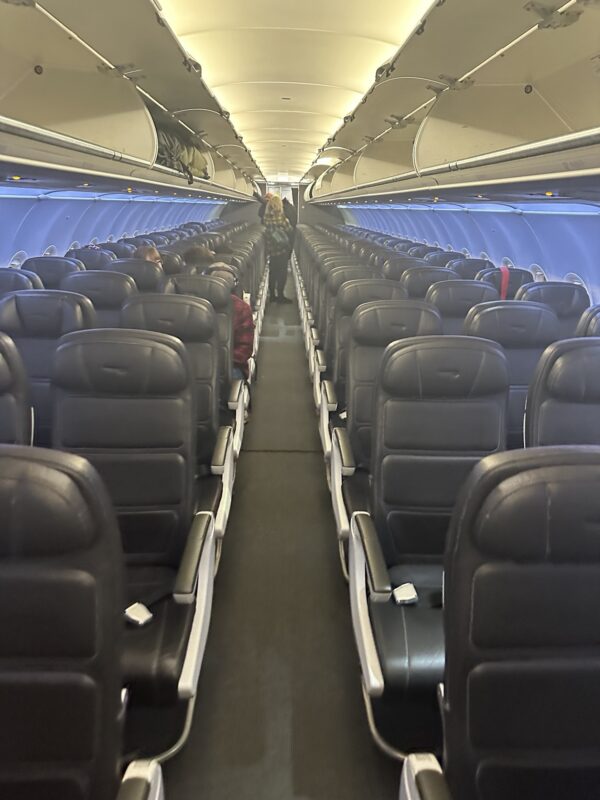 a row of seats in an airplane - British AIrways 749 - 