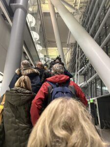 a group of people standing in a building