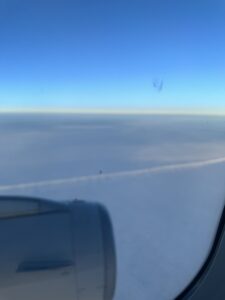 a view of clouds from an airplane window