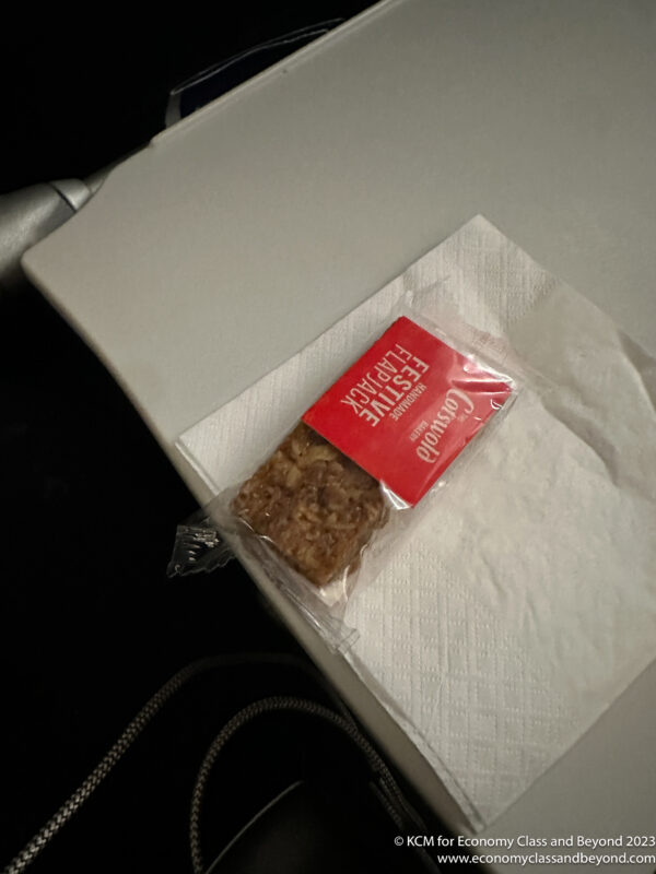 a small package of cereal on a napkin