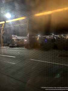 a view of an airplane from a window at night