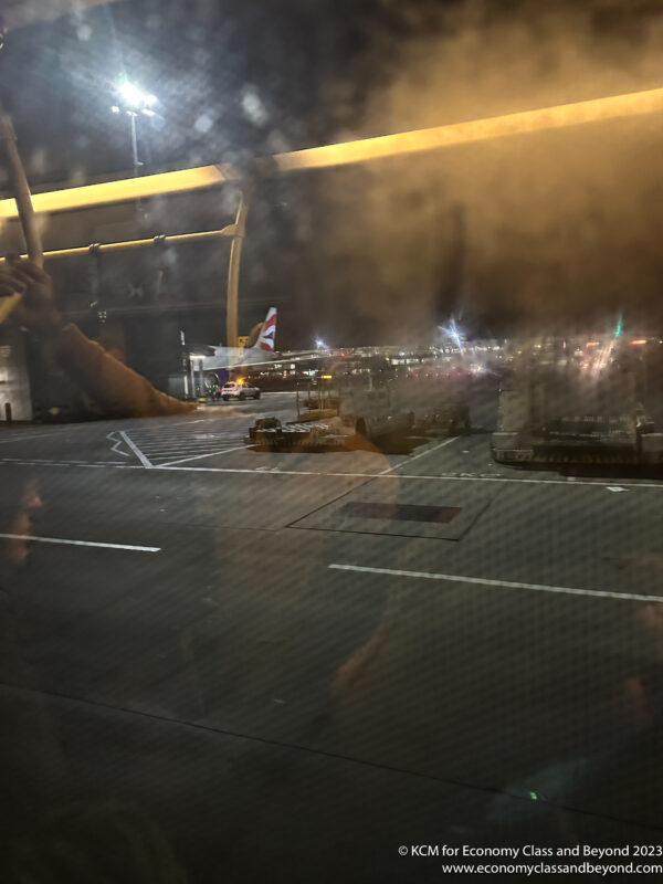 a view of a runway from a window at night