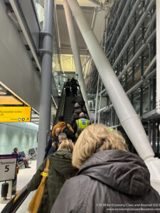 a group of people on an escalator