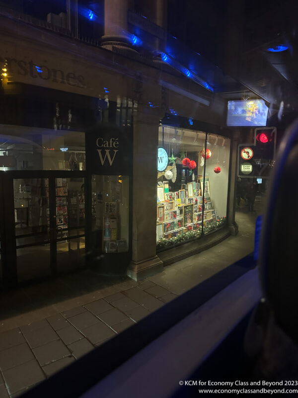 a storefront with a window at night