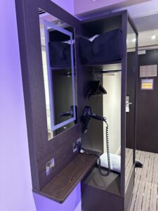 a mirror and a phone in a room