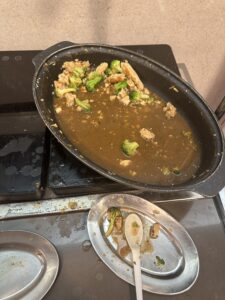 a pan of food on a stove