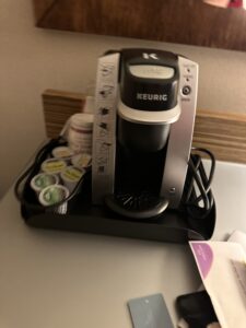 a coffee maker on a tray
