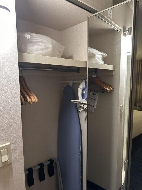 a ironing board in a closet
