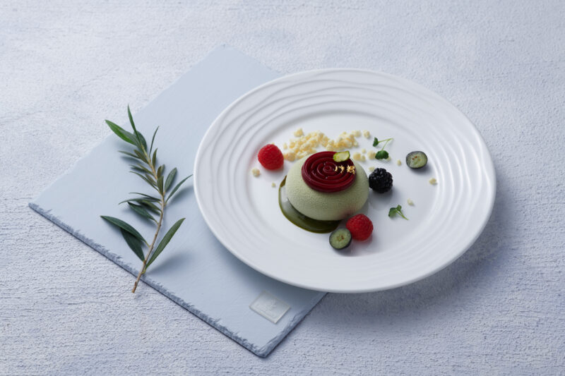 a plate of food on a white surface