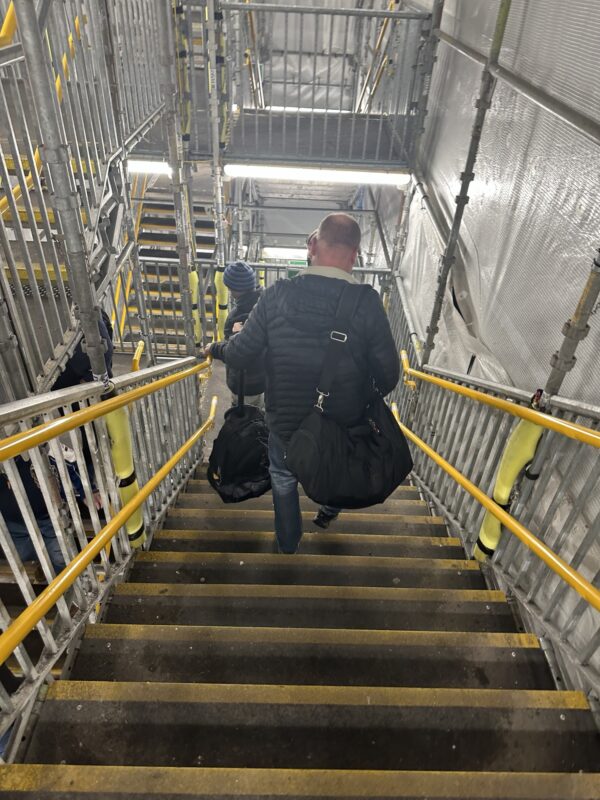 a man walking up stairs