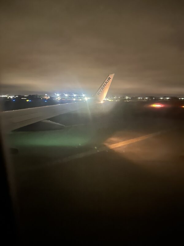 an airplane wing at night
