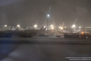 airplanes at an airport at night
