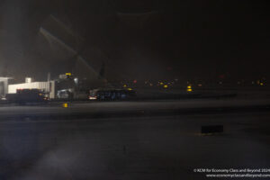a train at an airport at night