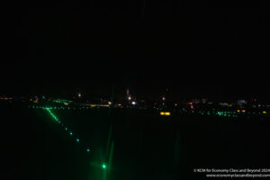a green lights on a field at night