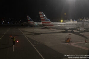 a plane on the runway at night