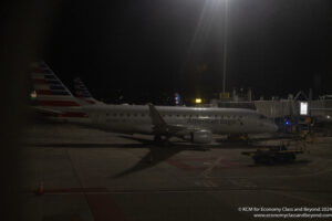 an airplane on the runway at night