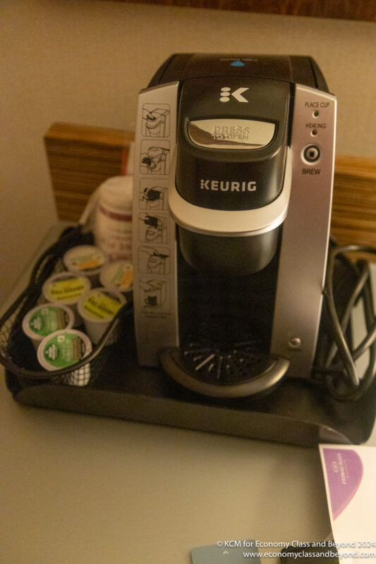 a coffee maker with a basket of k-cups