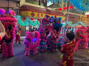 a group of people in clothing on a street