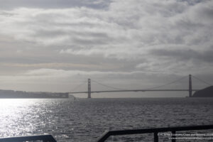 a bridge over water with a body of water and a body of water