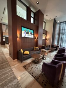 a room with couches and tables