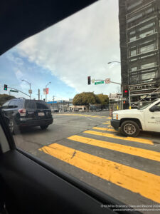 a view from a car window of a traffic light on a street
