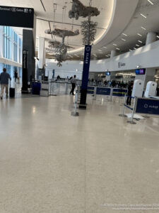 people walking in a large airport