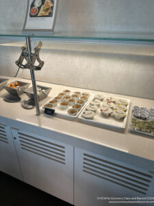 a counter with different types of food on it