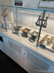 a counter with bowls of food