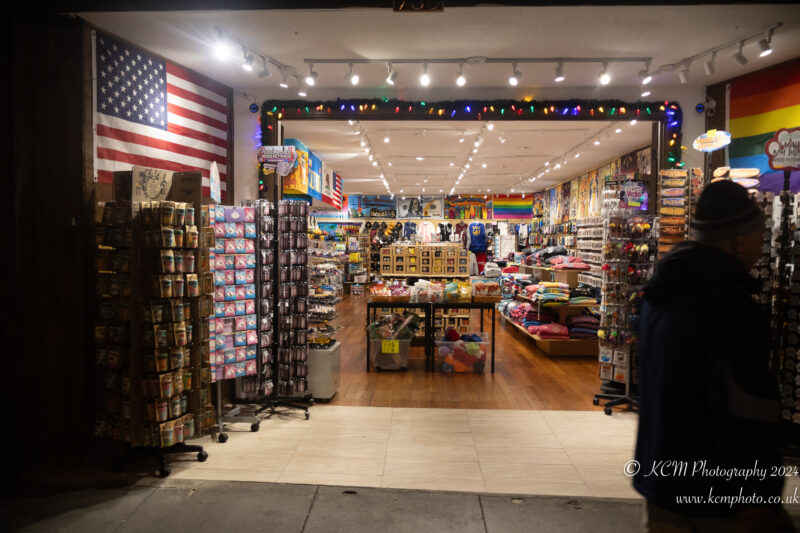 a store with a flag and shelves of goods