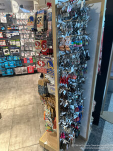 a shelf with keychains and keys