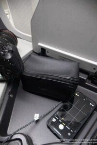 a camera and a wallet on a table