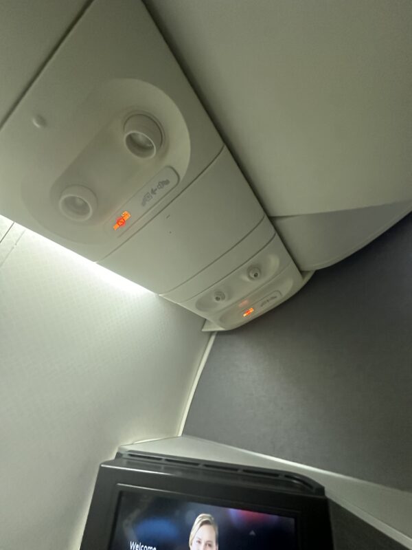 a overhead light on a plane