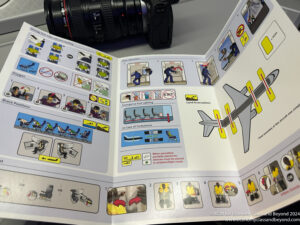 a camera next to a paper