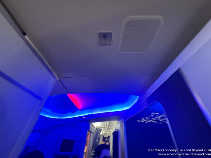 a blue and white ceiling with lights