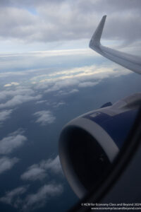 an airplane wing and the sky