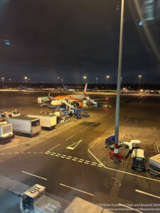 an airport with airplanes parked on the ground