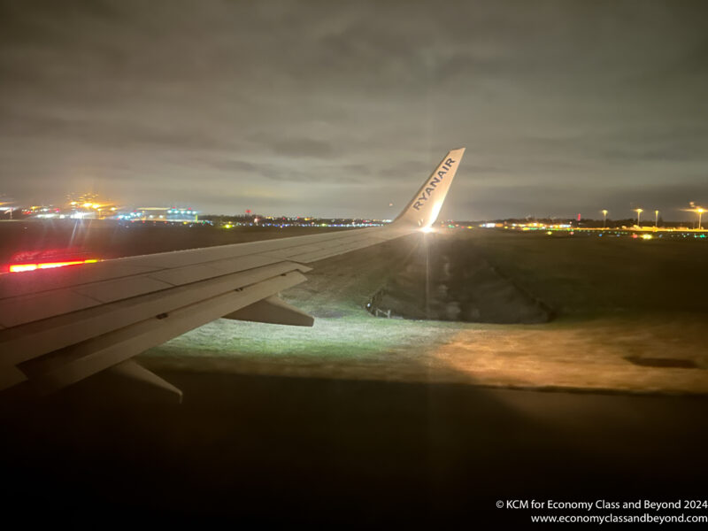 an airplane wing at night