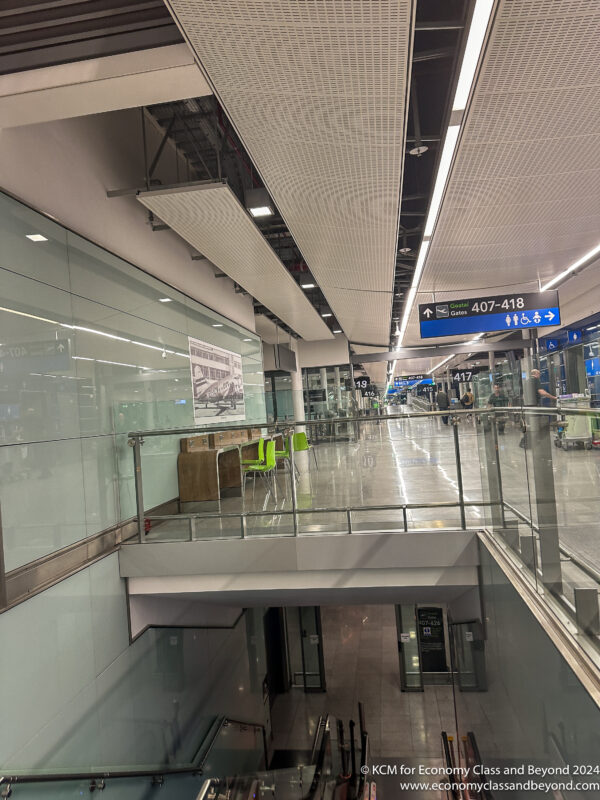a glass walkway in a building