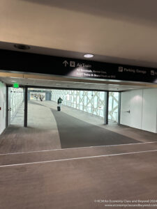 a person walking in a parking garage