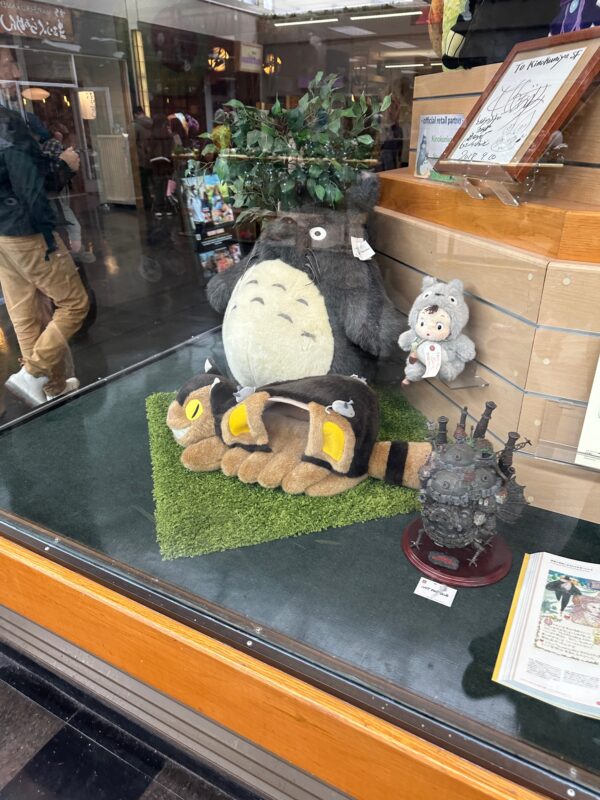 a stuffed animals on a display case