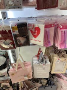 a shelf with bags and spoons