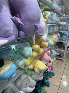 a shelf with stuffed animals