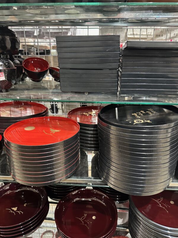 a stack of plates on a shelf