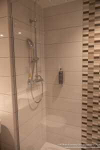 a shower with a shower head